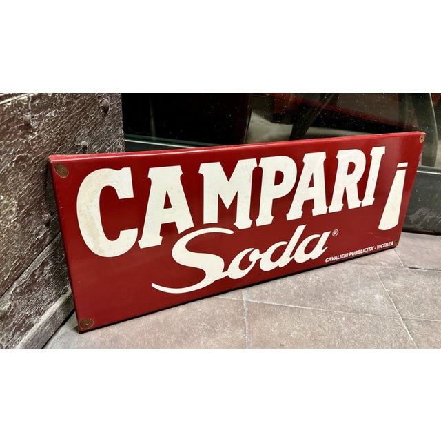 Vintage enameled iron Campari Soda advertising sign in good condition. This piece has an attribution mark, I am sure that...