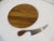 A two piece teak charcuterie board with matching teak handled stainless steel knife designed by Vivianna Torun for Dansk...