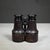 ABOUT An antique pair of leather wrapped expandable binoculars with enamel over brass body. The telescoping cylinders that...