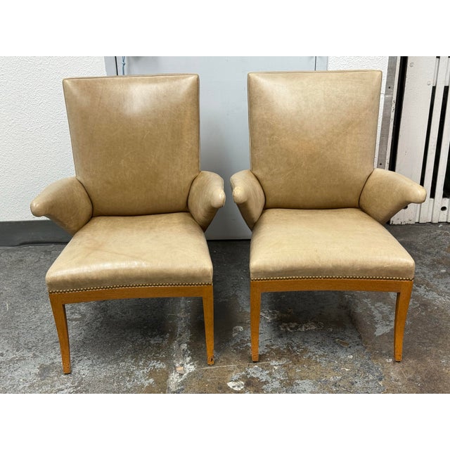Design Plus Gallery presents a Pair of Swedish Library Armchairs from Rose Tarlow Melrose House. This pair has tan leather...