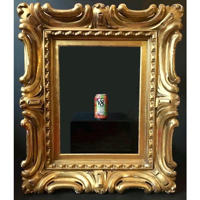 This is a magnificent antique Venetian Sansovino style high relief carved, richly water gilded and highly burnished frame....