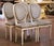 Bring timeless French elegance to your dining room or breakfast area with this set of four antique-style dining chairs...