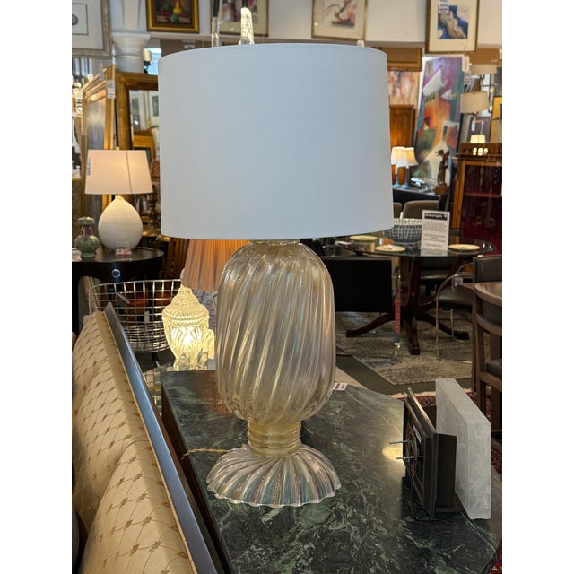 Design Plus Gallery presents the Moonglow Gold Leaf Swirled in Glass Table Lamp by Jan Showers for Kyle Bunting. The...