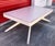 Wonderful mid century Castro Convertible white Formica coffee and dining table. Circa 1960s. Made in the USA. Converts...