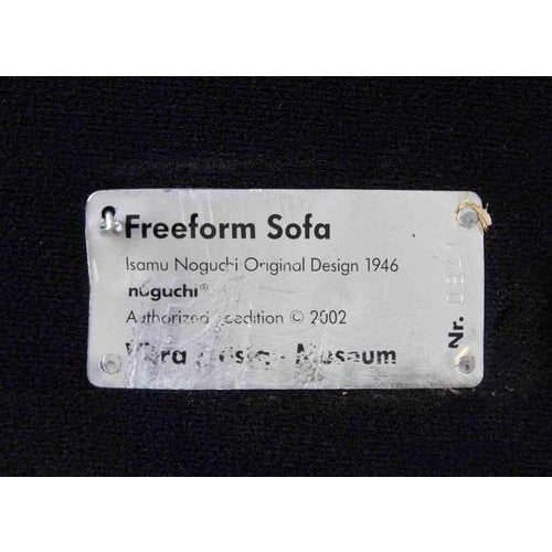 Freeform sofa is a design item realized by isamu noguchi produced by vitra. Wood and fabric sofa. Vitra original label and...