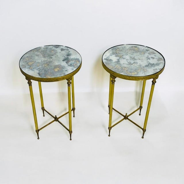Pair of circular side table or end table, in brass and oxyde mirror circa's 1950 . Very good condition.