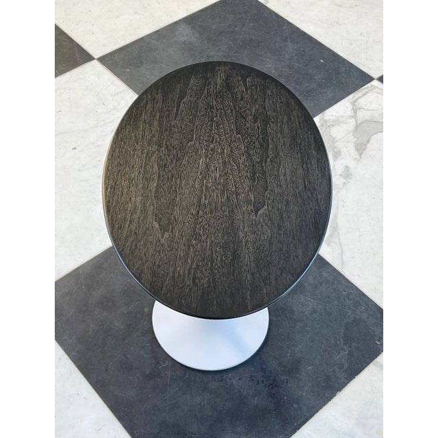 A Mid Century Modern Eero Saarinen for Knoll Tulip Side Table. It retains the original old Knoll label. The table has been...
