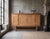 A beautiful and substantial oak sideboard designed by henning kjærnulf for eg møbler, denmark, dating from the late 1960s....