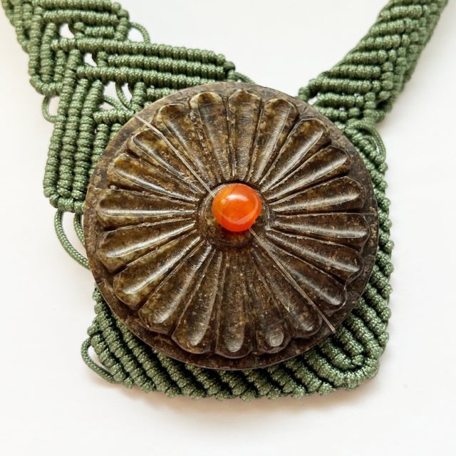 Stunning, expertly woven green macramé necklace, from Cambodia. Asymmetric. Unique. Red jade adornment affixed to a...