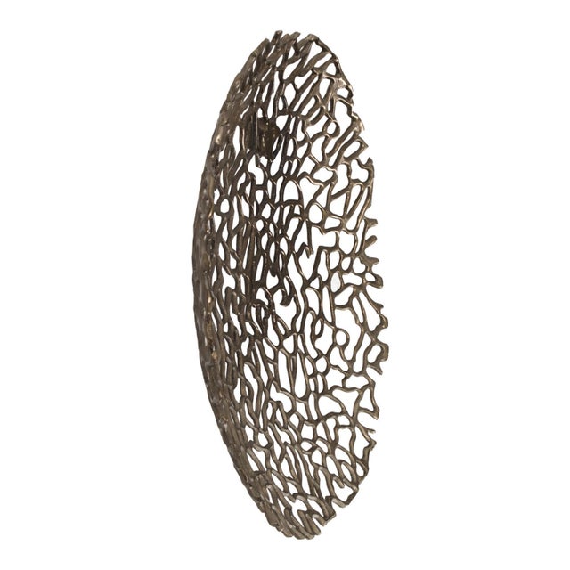 This wall art is fashioned from intertwined aluminum strips that come together to create a great abstract, woven texture....
