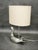 A delightful italian table lamp dating from the 1970s, combining playful sculptural design with refined mid-century modern...