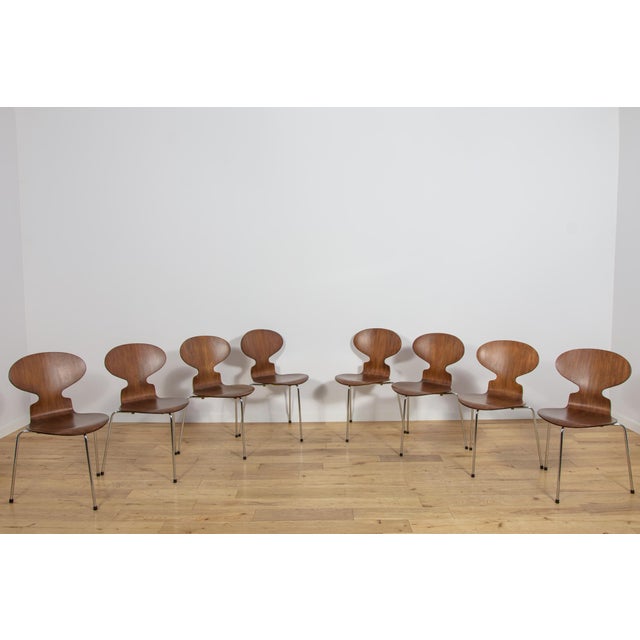 This set of eight iconic Model 3101 “Ant” chairs was designed by Arne Jacobsen for the renowned Danish furniture...