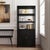 Sleek, refined, and endlessly functional, the Butler Specialty Company Nora Wood Etagere Bookcase with Cabinet is a...