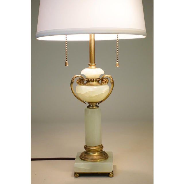 A sophisticated and elegant large pale Green Onyx Marble Bronze/Brass Art Deco Neo Classic Urn/Column table lamp designed...