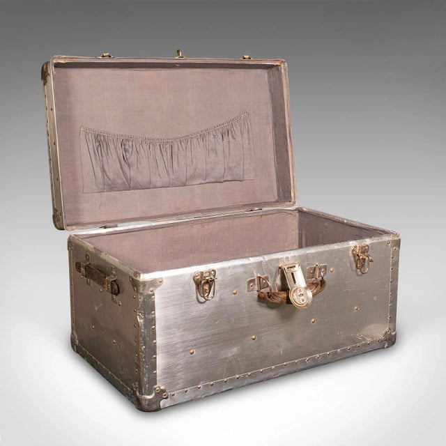 This is an antique shipping trunk. A Continental, aluminium travelling chest, dating to the Edwardian period, circa 1910....