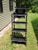 Vintage Eastlake Black Ebonized Etagere Bookcase Display Shelves. Features a small top shelf with finials above a beveled...