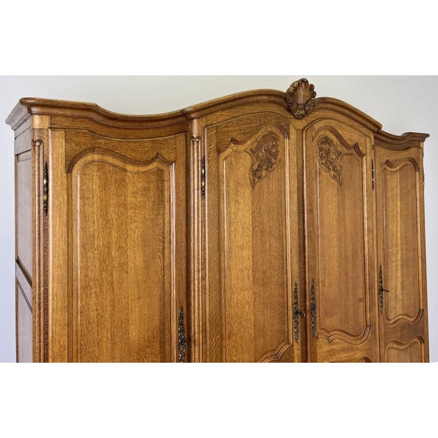 Vintage Louis XVI French Oak Four Door Carved Armoire For Sale - Image 9 of 11