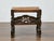 This English bench from circa 1900 offers a charming blend of utility and decorative detailing, suitable for both period-...