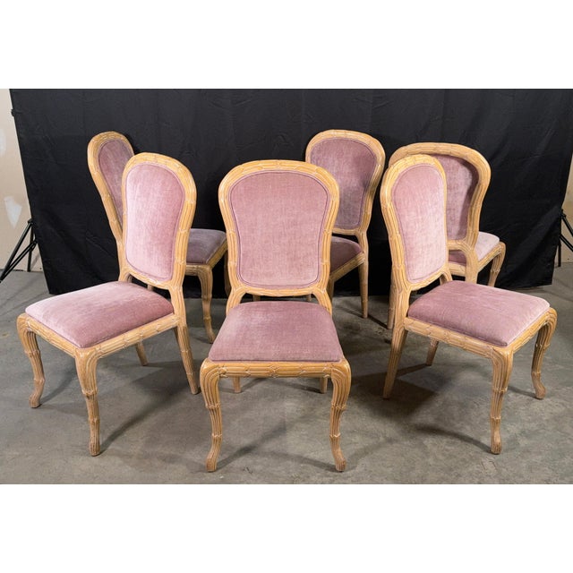 This set of six Italian dining chairs combines a Louis XVI-inspired medallion back with an all-over carved faux bois frame...