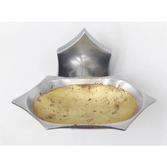 Vintage Art Deco style wall mount soap dish made of brass with a nickel finish. The mounting bracket is attached. The...