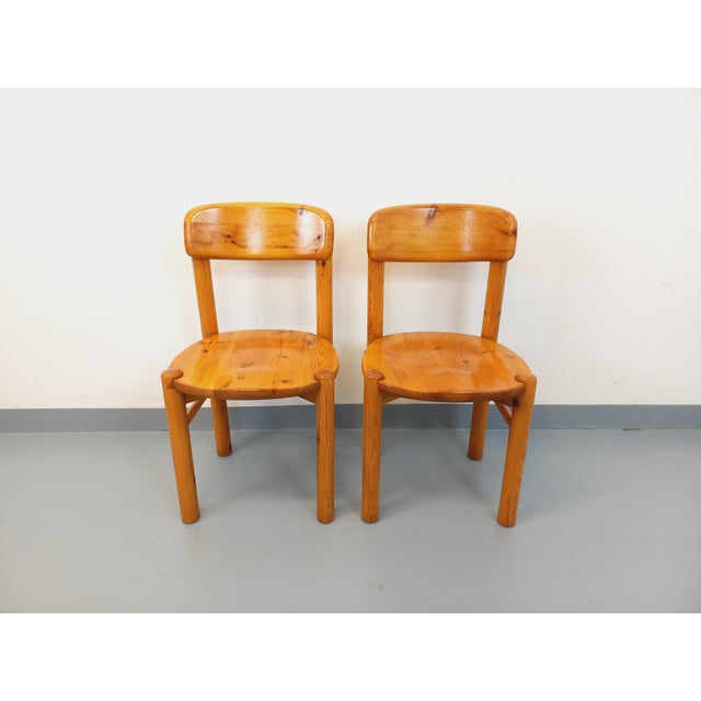 Two vintage Scandinavian chairs from the 1970s, attributed to the Danish designer Rainer Daumiller, made of pine, in very...
