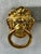 Gold tone lion head pierced earrings with rhinestone eyes by Kenneth Jay Lane. A fierce Eighties comeback made in 1986....