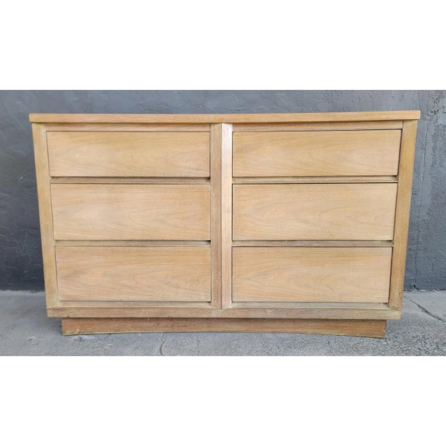 Mid-Century-Modern Cerused walnut 6 drawer low dresser by Kent Coffey. Circa. 1950's. Features 6 large drawers. Fine...