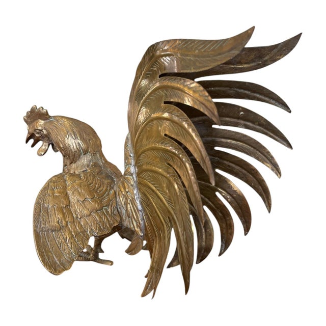 Sculptural rooster figurine featuring a dimensional body with an exaggerated, fan-shaped tail and outstretched wings. The...