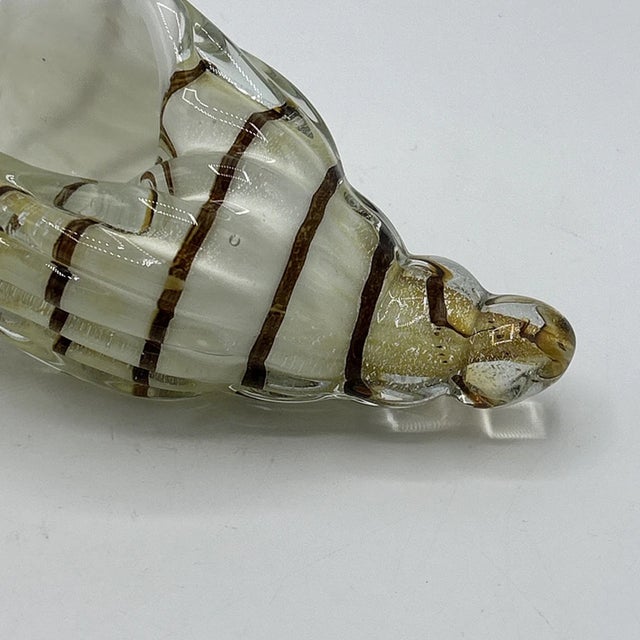 Bring timeless coastal elegance to your décor with this stunning vintage Murano-style art glass conch seashell figurine....