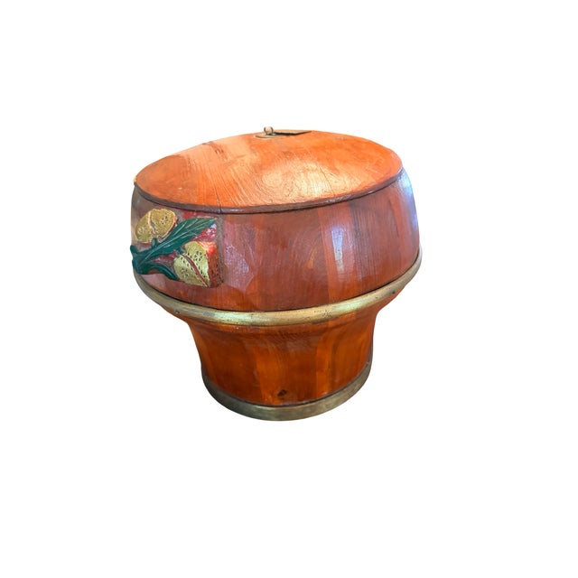 An exceptional 19th-century Chinese wedding rice bucket, beautifully crafted from wood with a rich reddish-brown finish,...