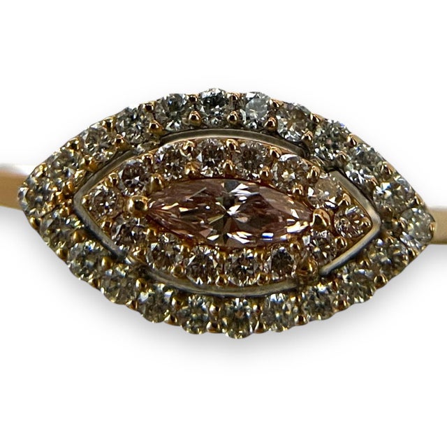 This piece is perfect for a night out with friends or a family event. Made out of 14k yellow gold and inlaid with a...