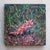 This oil on wood panel depicts a young fox nestled among lush grasses, its striking orange fur contrasting beautifully...