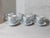 This is a Lomonosov Russian porcelain tea cup and saucer set, likely featuring the "Forget-Me-Not" pattern on a "Twisted"...