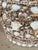 A wonderfully unique vintage resin planter completely covered by hand in an incredible assortment of natural seashells....
