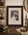 A beautifully preserved early 20th-century hand-colored bridal portrait presented in its original carved wood frame and...