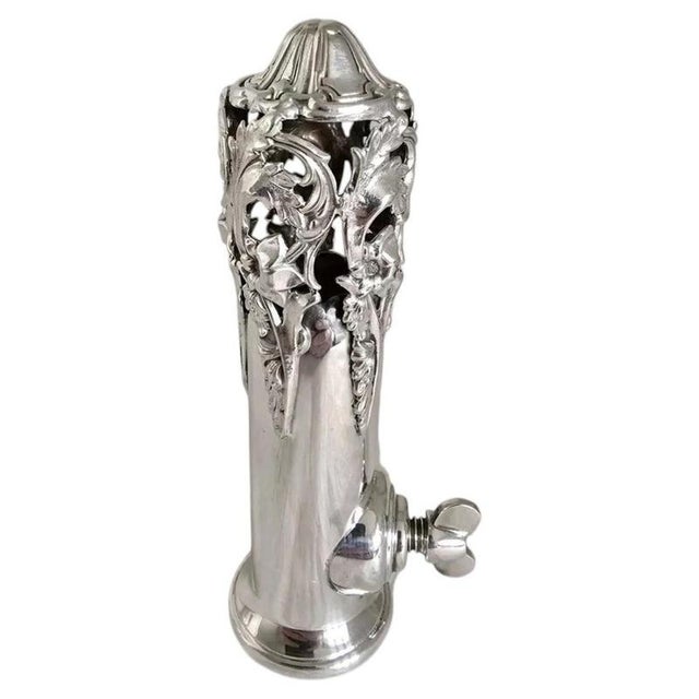 A finely crafted vintage sterling silver posy holder, designed for securely holding a bouquet of flowers and particularly...