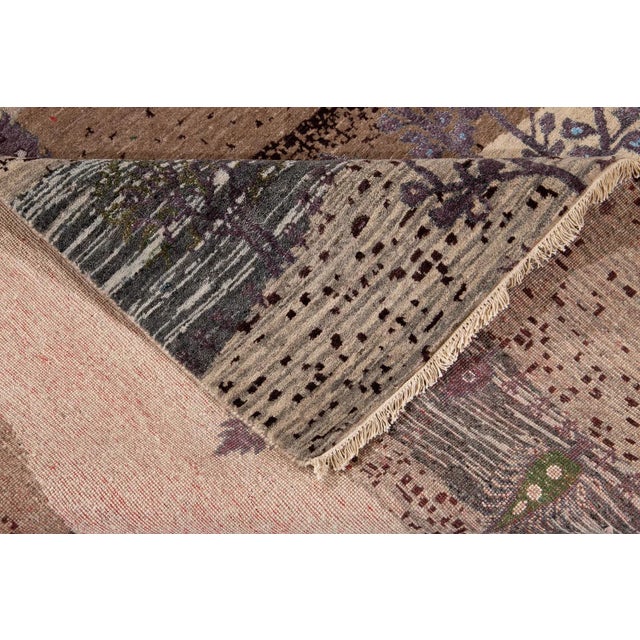 Beautiful contemporary Gabbeh design rug with an ivory field and beautiful all-over multi-color design. This rug measures...