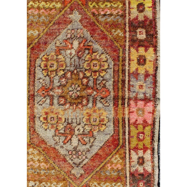 Colorful vintage Turkish Small Oushak with floral medallion and border, Keivan Woven Arts, rug #DUR-3457, country of...