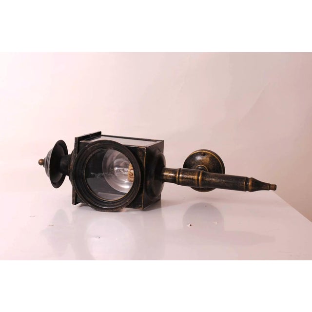 Here is an outdoor wall light made of zinc-plated metal with copper highlights. It would also look great in a loft for an...