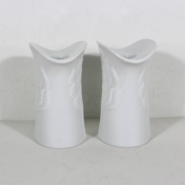 Pair of matte white bisque porcelain candle holders made in Germany in the 60’s. The tops are glossy. They are mid century...