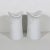 Pair of matte white bisque porcelain candle holders made in Germany in the 60’s. The tops are glossy. They are mid century...