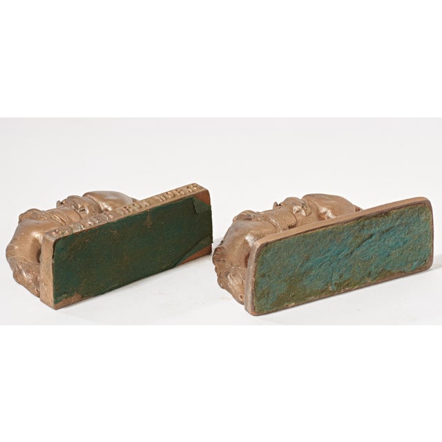 Perfect for the western cowboys library. These bookends have been painted a gold/bronze color showing signs of fading....
