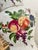 A striking vintage porcelain vase by United Wilson, beautifully decorated with colorful fruit, foliage, butterflies and...