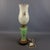 Stunning vintage table lamp, made of white and opaline water green Murano glass, with beautiful silk-screened floral...