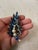Stunning vintage blue rhinestone with faux pearls and details.