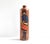 An antique brown stoneware gin or liquor bottle hand-painted with a Revolutionary-era soldier in a black bicorne hat and...