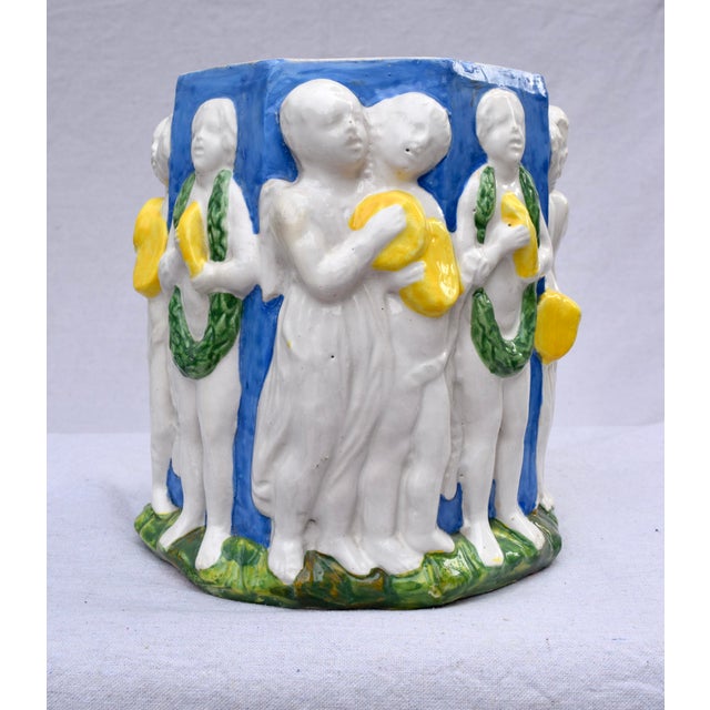 A scarcely seen early 20th century high relief hand made & painted polychrome glazed Terra Cotta pottery planter in the...
