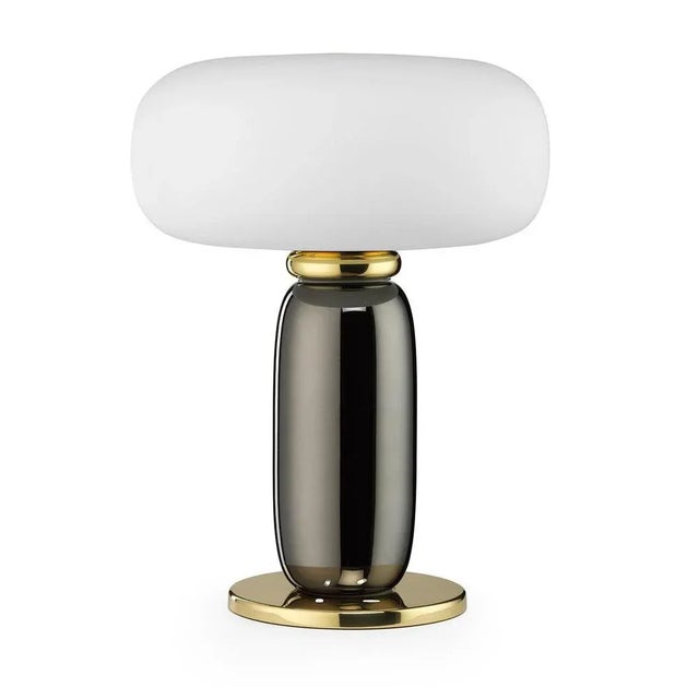 A fascinating combination of hues and materials, this table lamp will make an elegant addition to a console or writing...