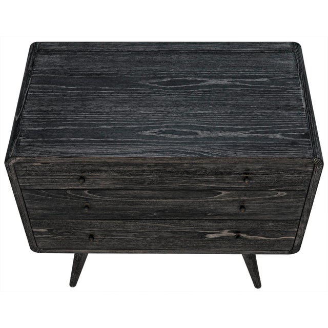 Mid-century modern with a dash of whimsy tossed in, this three-drawer chest finishes its retro-futuristic deign with a...