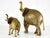 This delightful pair of vintage brass elephant figurines captures the beauty and grace of these majestic animals. The...